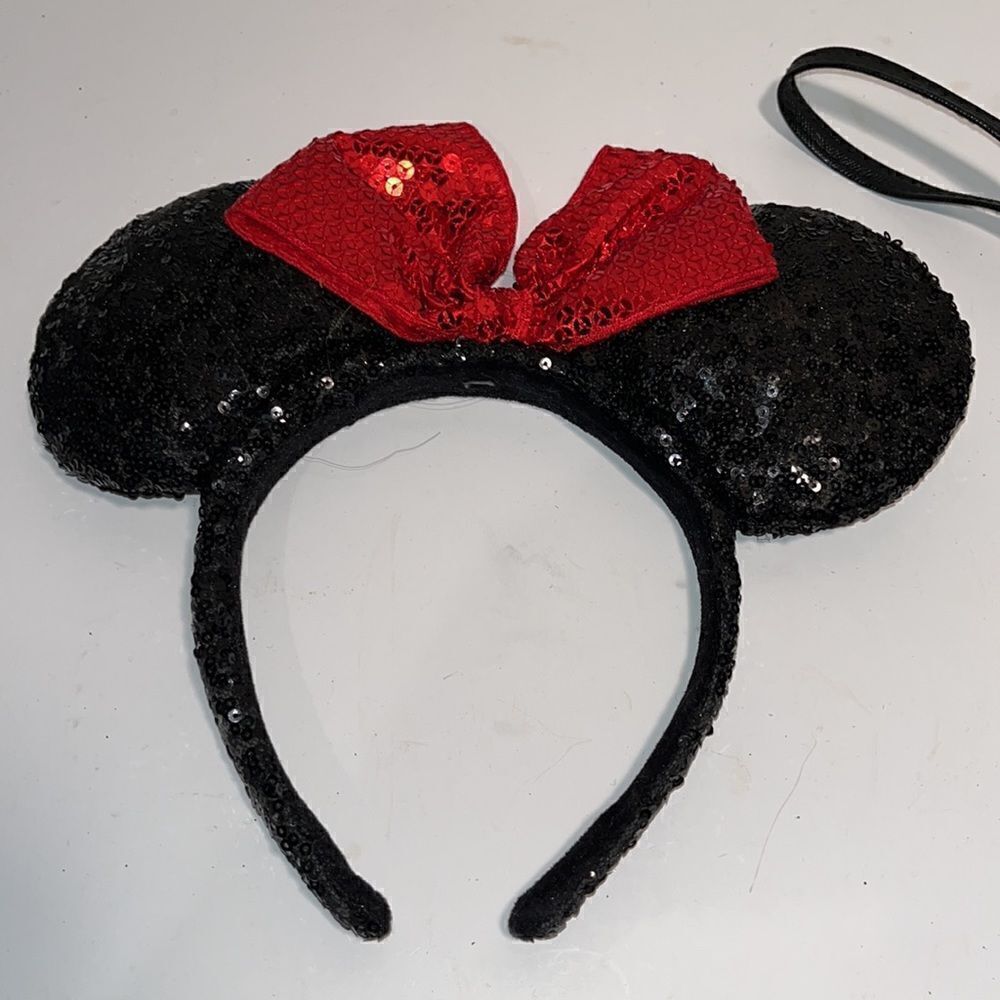 Disney wristlet 6.5”x4.5”x7”, and Minnie Mouse’s glitter ears. - Picture 3 of 5